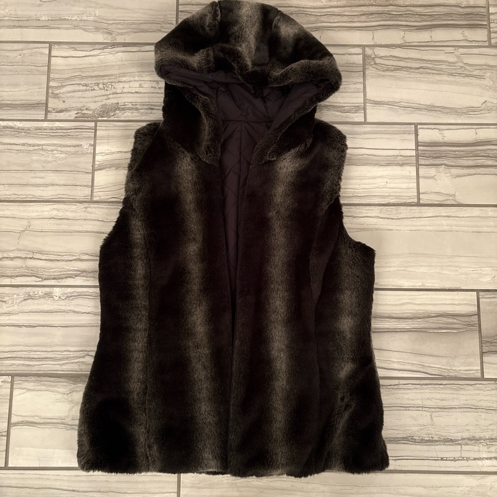 Super warm faux fur lined vest with hood.